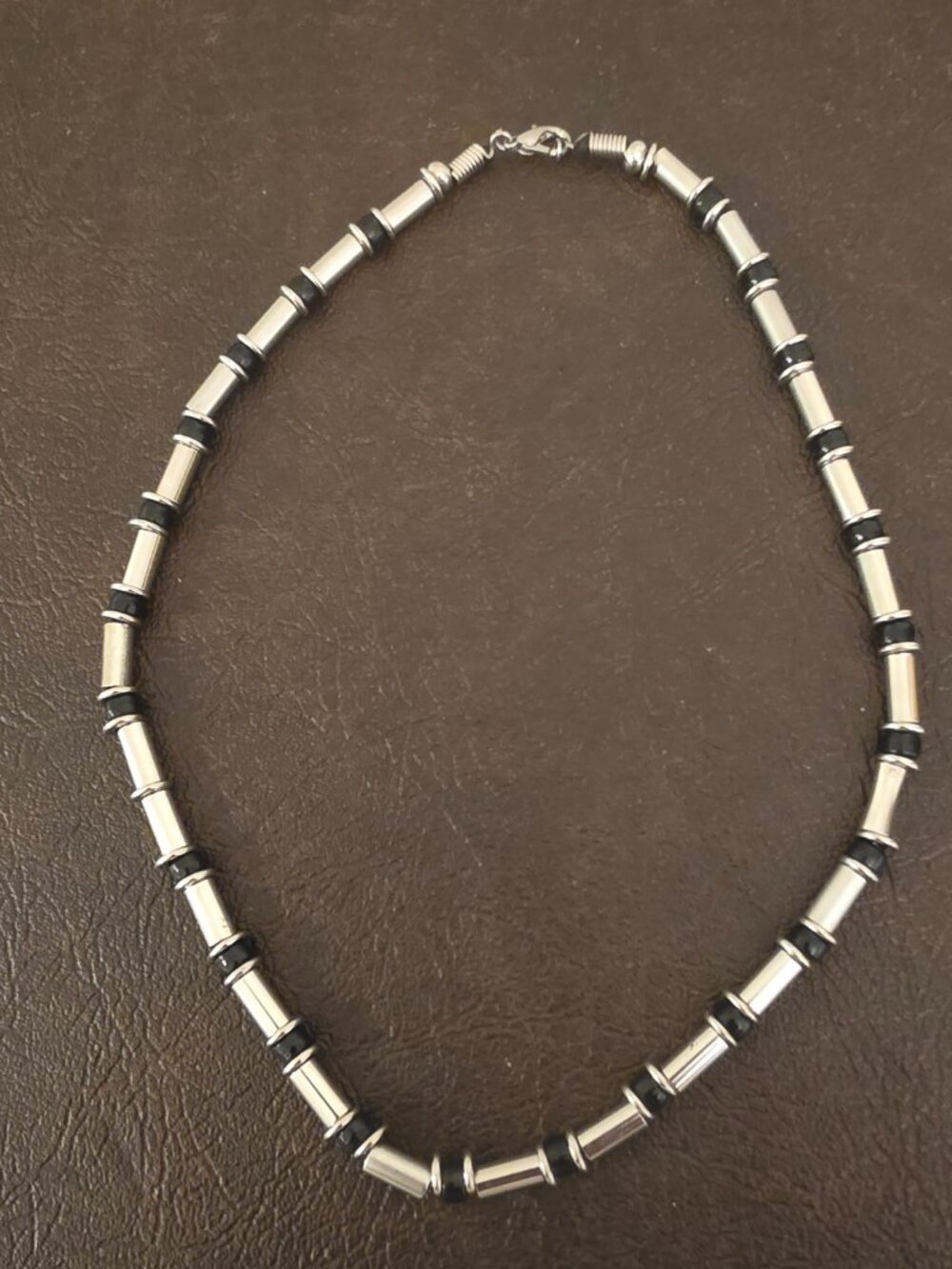 SilverTone Choker Necklace features cylindrical beads with a bamboo design